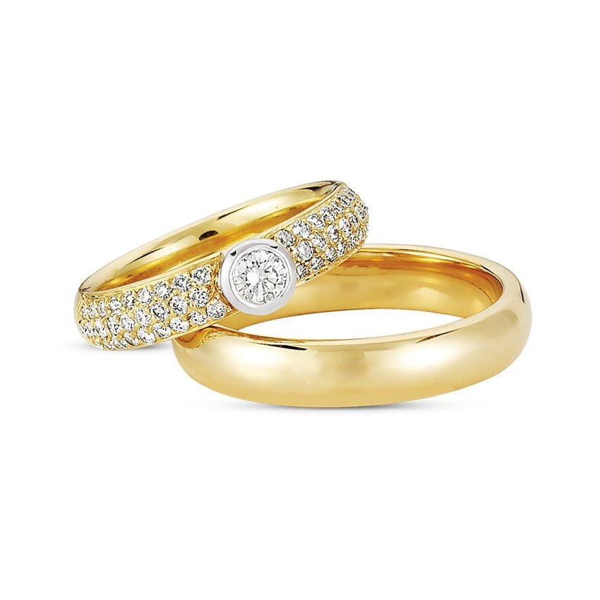 Luksuriøse Nuran vielsesringe i 14 karat guld med 0,74 ct diamanter
